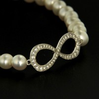 Süßwasser-Perlenarmband (5,5 mm) 18 cm elastisch mit Zwischenteil Silber 925 rhodiniert unendlich